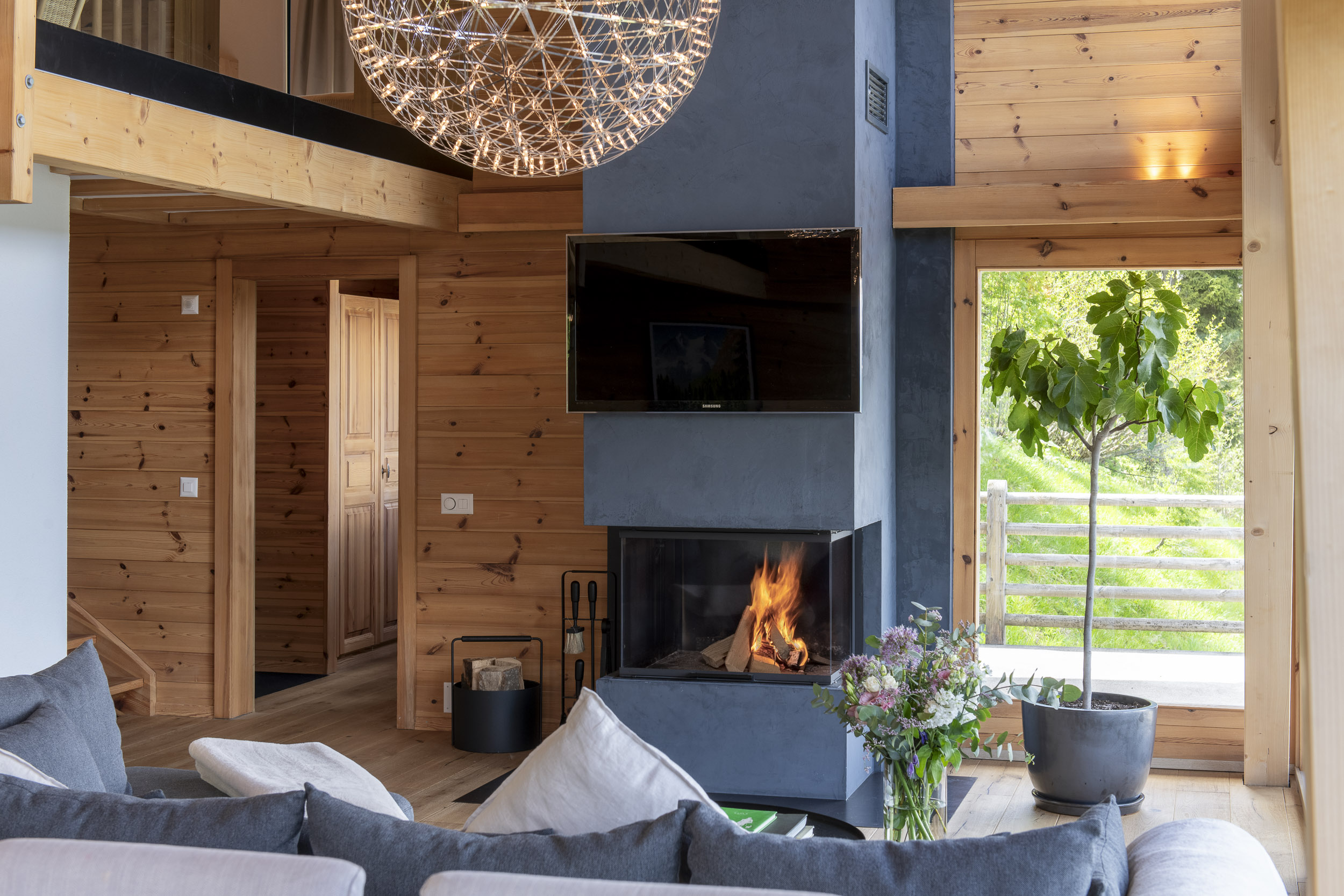 Fireplace in the main living area at Chalet La Chance